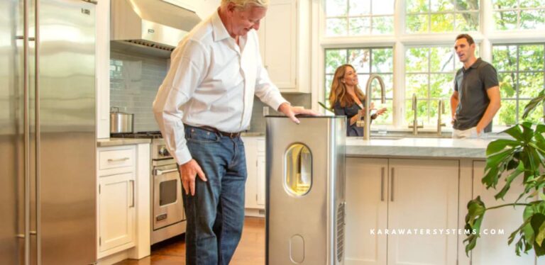 Man standing next to Kara Pure 2